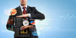 Business man holding alarmclock