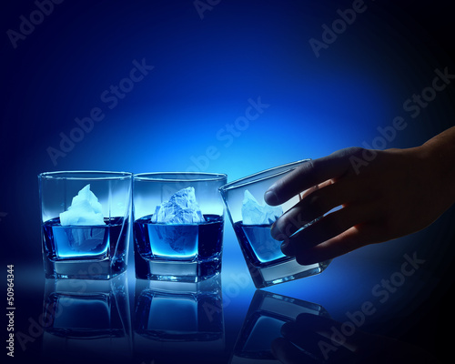 Photo: Three glasses of blue liquid Three glasses of blue liquid