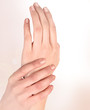 Beautiful woman hands isolated on a white background