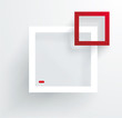 White and red frames on the wall.