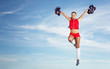 Young female cheerleader