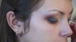 Video: Making-up the model for photo session in studio. Making-up the model for photo session in studio.