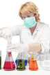 Photo: female laboratory staff dealing with test syringe female laboratory staff dealing with test syringe