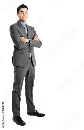 Photo: Young businessman isolated on white Young businessman isolated on white