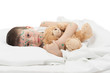 sick boy in white bed