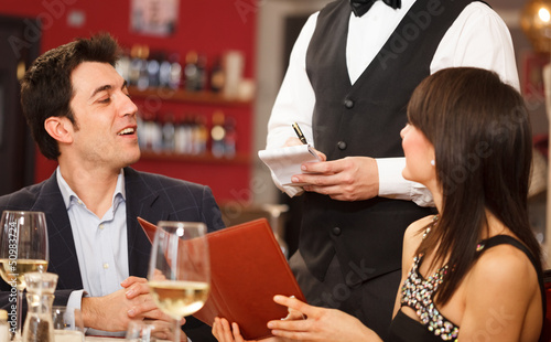 Photo: Couple having dinner Couple having dinner
