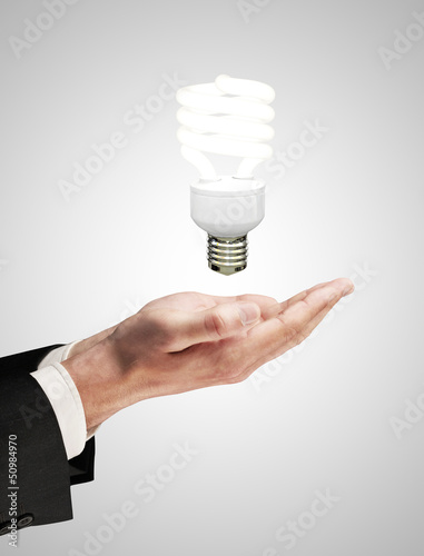 Photo: hand with lamp hand with lamp