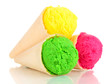 Three scoops of lemon, strawberry and kiwi ice cream in the