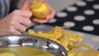 Peeling potatoes