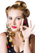 Happy woman with clothes peg