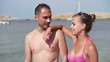 Happy couple stand by the sea, super slow motion