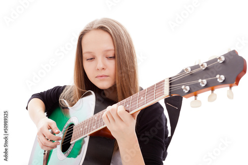 Photo: Beautiful girl with guitar on white background Beautiful girl with guitar on white background