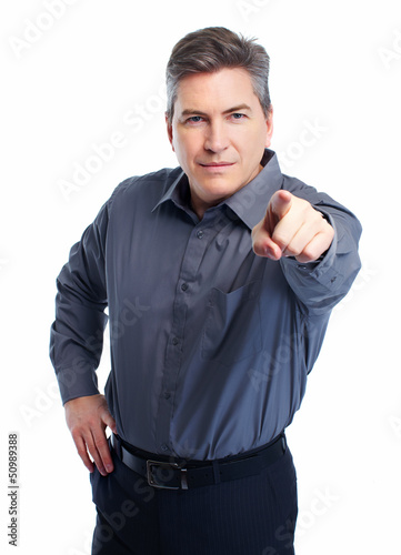 Photo: Businessman isolated on white. Businessman isolated on white.