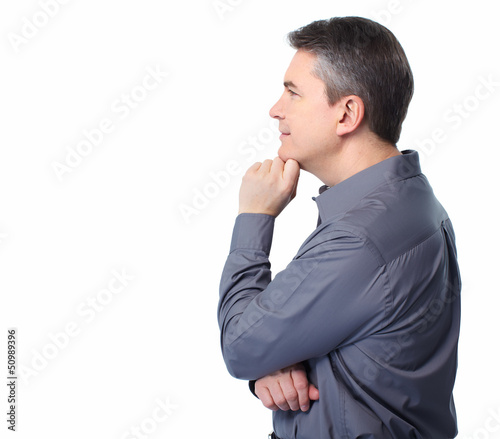 Photo: Businessman isolated on white. Businessman isolated on white.
