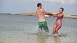 Couple playing in the sea, super slow motion, shot at 240fps