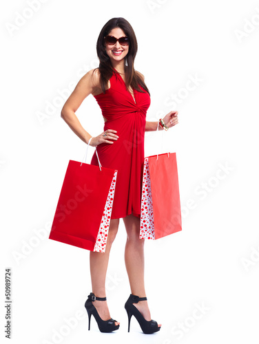 Photo: Beautiful woman with shopping bags. Beautiful woman with shopping bags.