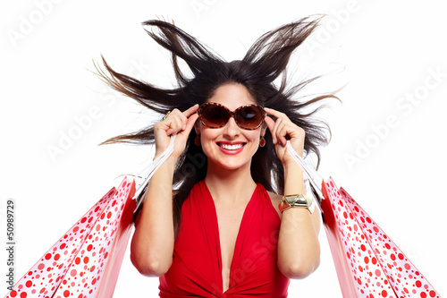 Photo: Beautiful woman with shopping bags. Beautiful woman with shopping bags.
