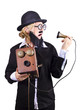 Woman holding antique telephone