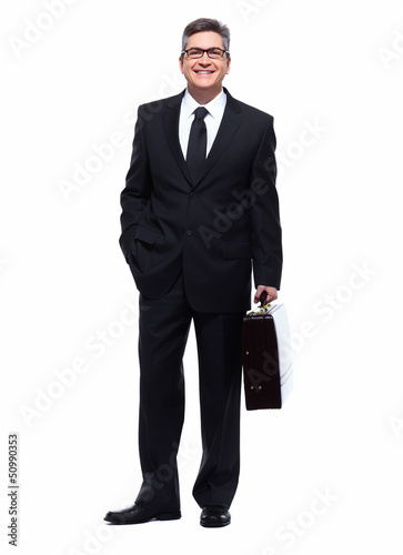 Photo: Businessman isolated on white. Businessman isolated on white.