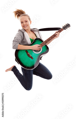 Photo: Beautiful girl with guitar on white background Beautiful girl with guitar on white background