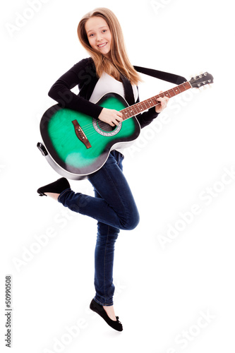 Photo: .Beautiful girl with guitar on white background .Beautiful girl with guitar on white background