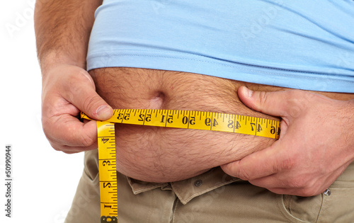 Photo: Fat man with a big belly. Fat man with a big belly.