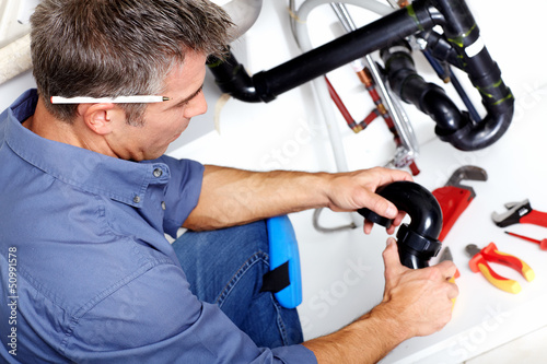 Photo: Plumber. Plumber.