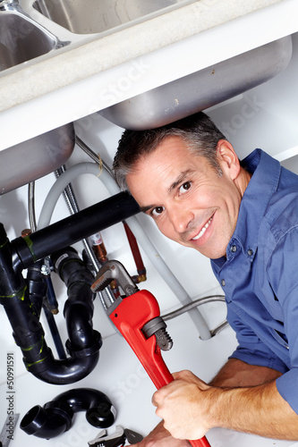 Photo: Plumber. Plumber.