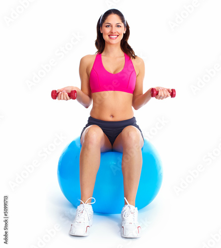 Photo: Young beautiful fitness woman. Young beautiful fitness woman.