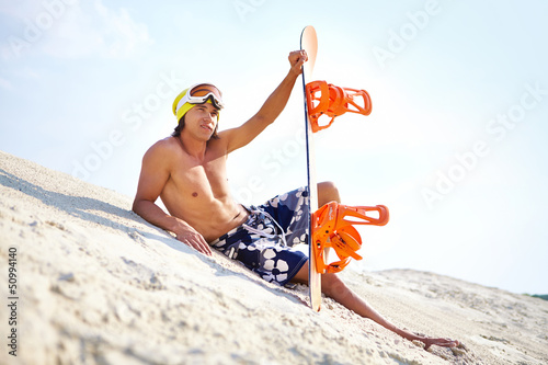 Photo: Sand-boarder at leisure Sand-boarder at leisure