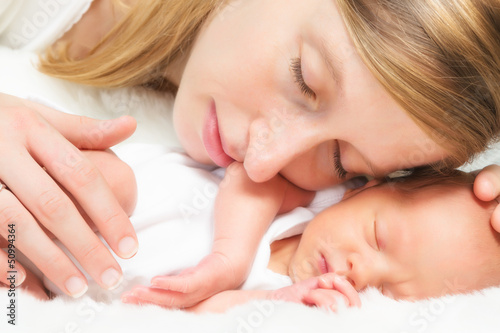 Photo: Cheek to cheek with her baby Cheek to cheek with her baby