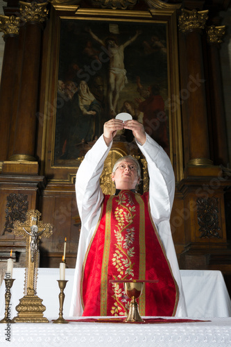 Photo: Consecration during catholic mass Consecration during catholic mass