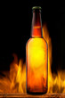 Beer bottle in fire on black