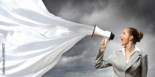 Photo: businesswoman with megaphone businesswoman with megaphone