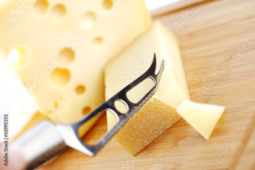 Photo: cheese with a cheese knife cheese with a cheese knife