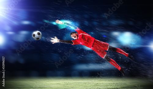 Photo: Goalkeeper catches the ball Goalkeeper catches the ball