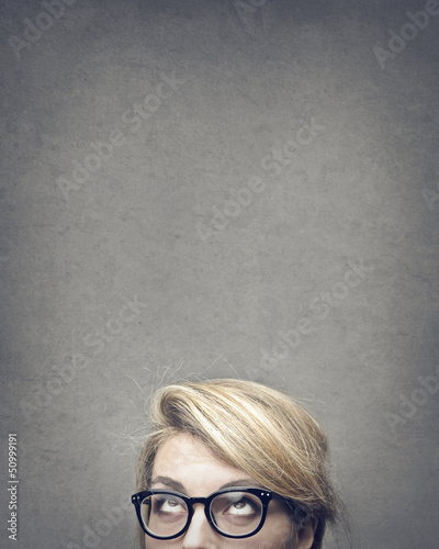 Photo: woman looks up woman looks up