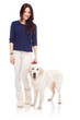 Beautiful young woman with a dog