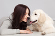 Beautiful young woman with a dog
