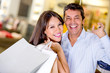 Shopping couple smiling