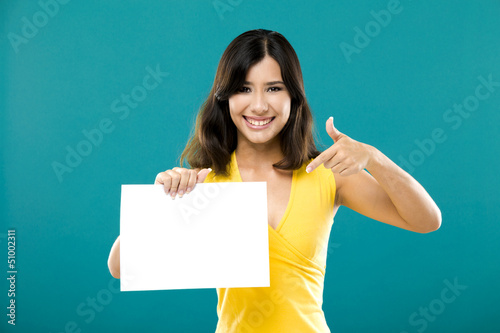 Photo: Holding a blank paper Holding a blank paper