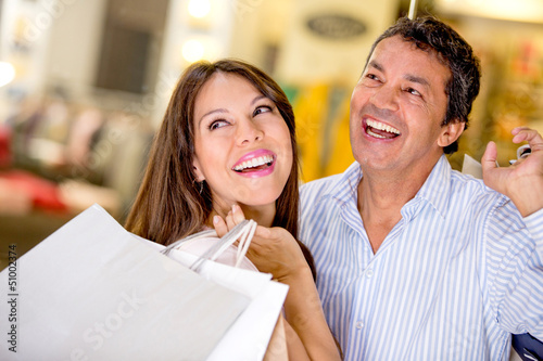 Photo: Couple at a shopping center Couple at a shopping center