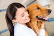 Doctor hugging a dog