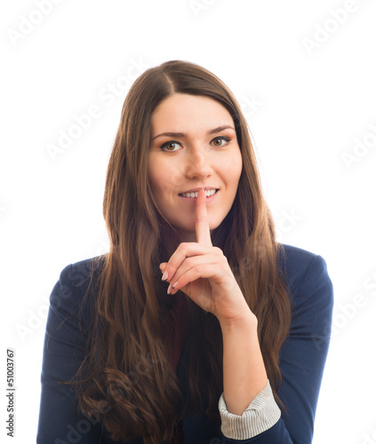 Photo: woman holds a finger near the mouth woman holds a finger near the mouth