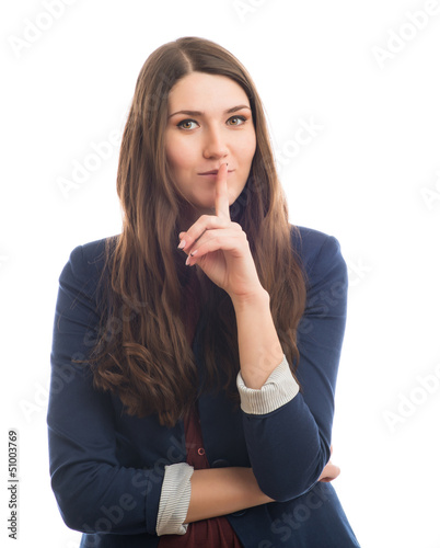Photo: woman holds a finger near the mouth woman holds a finger near the mouth