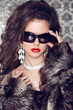 Luxury and Fashion Portrait of stylish woman model with sunglass