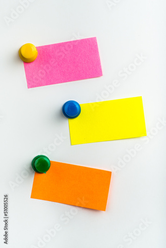 Photo: Three empty reminder notes on a white background Three empty reminder notes on a white background