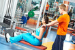woman with trainer at training simulator