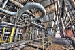 Old gas boiler and hoppers in an abandoned power plant