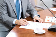 businessman taking notes